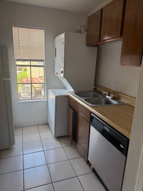 8323 Wilcrest Drive, Unit 8004 Houston, TX 77072 - Photo 6 of 12 a utility room with washer and dryer