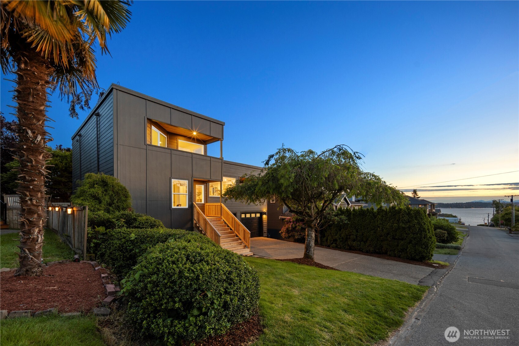 1005 North 33rd Street Renton, WA 98056 - Photo 1 of 36 a view of a house with a yard
