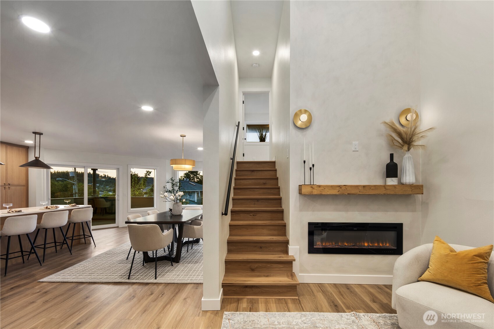 1005 North 33rd Street Renton, WA 98056 - Photo 11 of 36 a living room with furniture and a fireplace