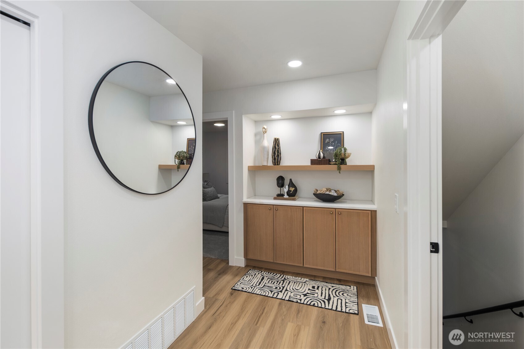 1005 North 33rd Street Renton, WA 98056 - Photo 14 of 36 a view of a kitchen with wooden floor and a sink