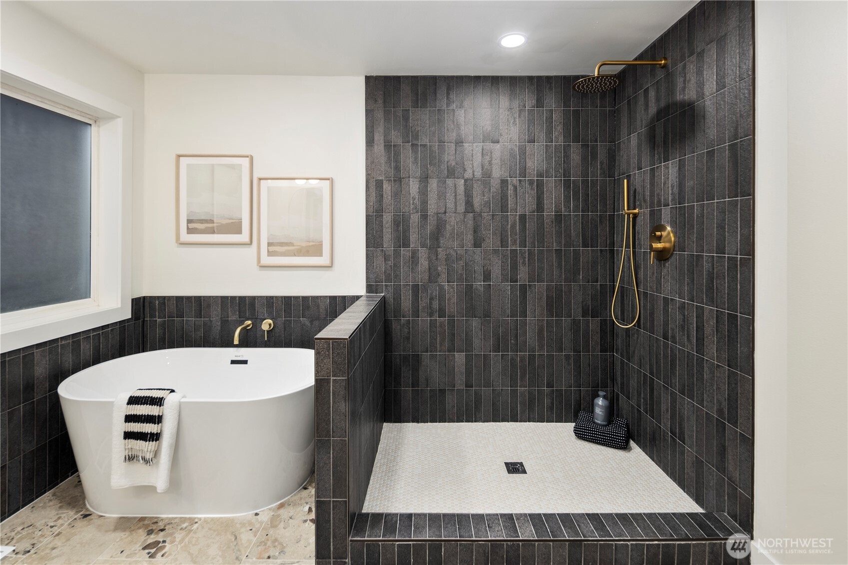 1005 North 33rd Street Renton, WA 98056 - Photo 19 of 36 a bathroom with a tub a sink and mirror