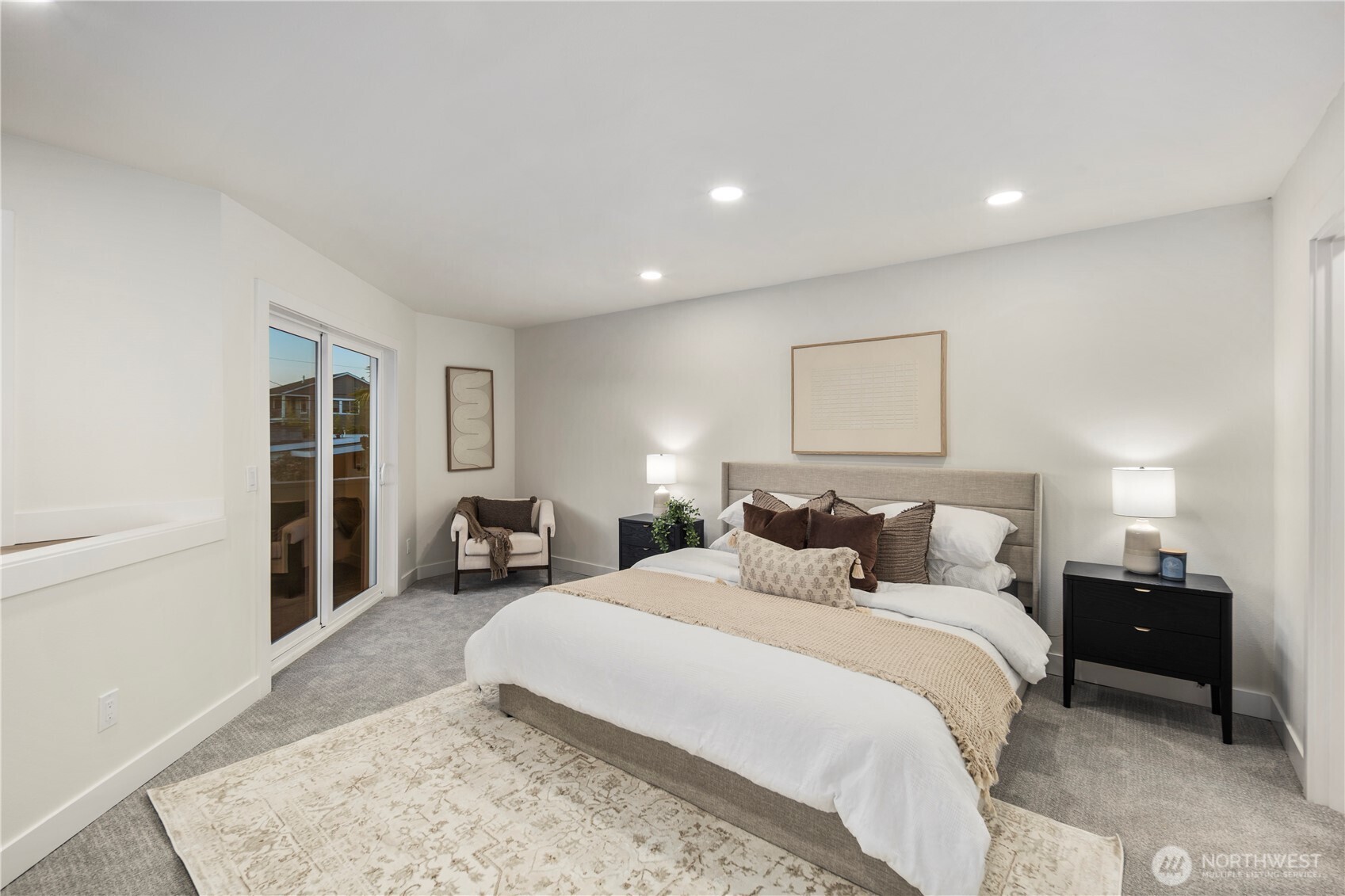 1005 North 33rd Street Renton, WA 98056 - Photo 20 of 36 a bedroom with a bed and a large mirror on dresser