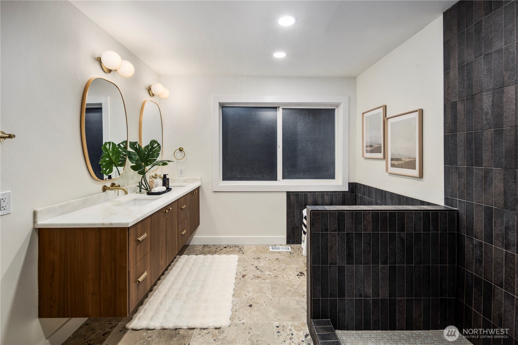 1005 North 33rd Street Renton, WA 98056 - Photo 23 of 36 a bathroom with a double vanity sink and a mirror