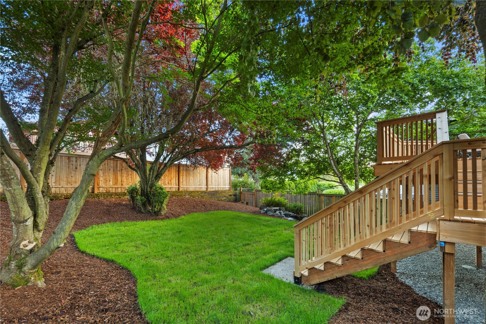 1005 North 33rd Street Renton, WA 98056 - Photo 29 of 36 a view of a house with a yard