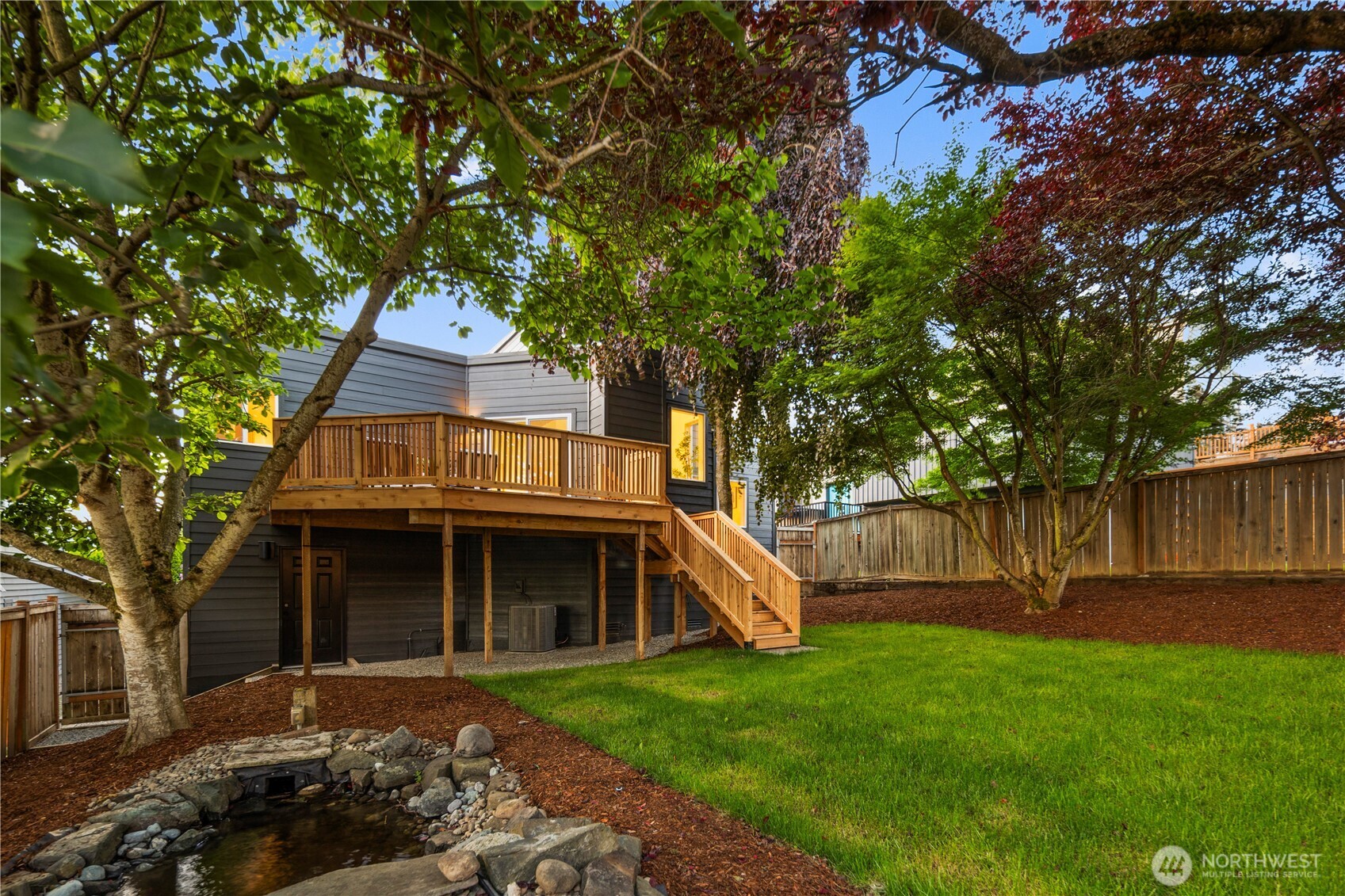 1005 North 33rd Street Renton, WA 98056 - Photo 30 of 36 a front view of a house with a yard