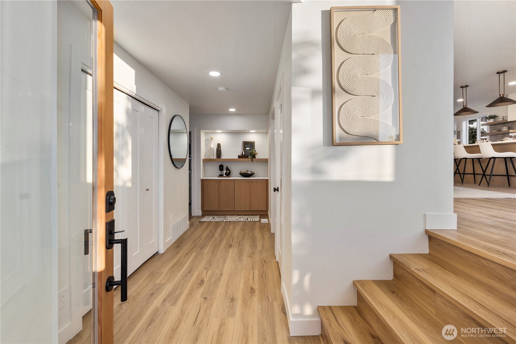 1005 North 33rd Street Renton, WA 98056 - Photo 4 of 36 a view of a hallway with wooden floor and entryway