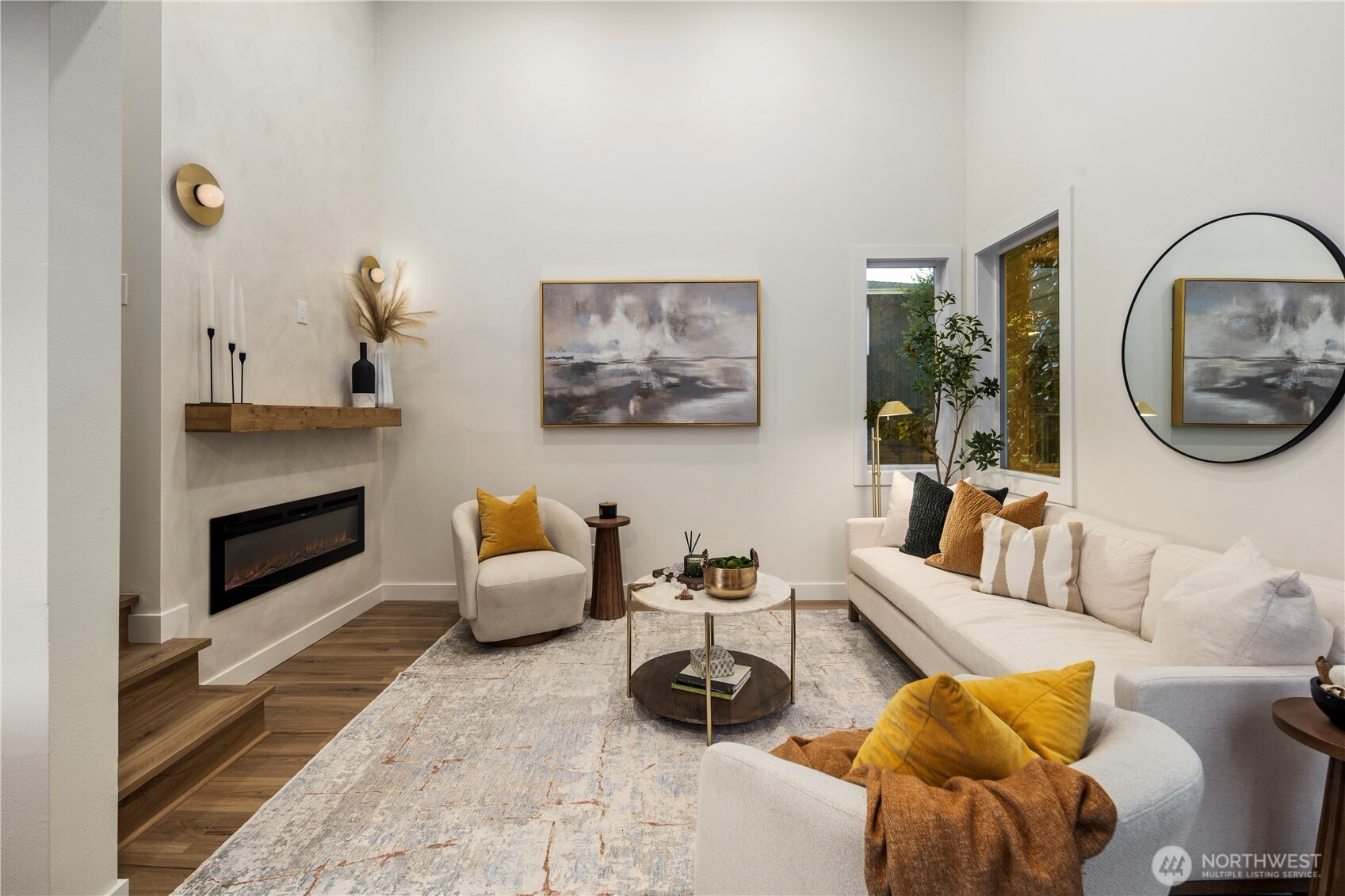 1005 North 33rd Street Renton, WA 98056 - Photo 10 of 36 a living room with furniture and a fireplace