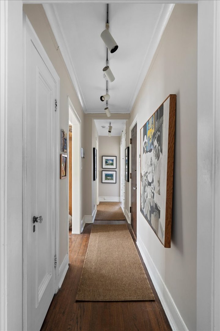 594 Sheridan Square, Unit 3 Evanston, IL 60202 - Photo 5 of 14 a view of entryway with window and wooden floor