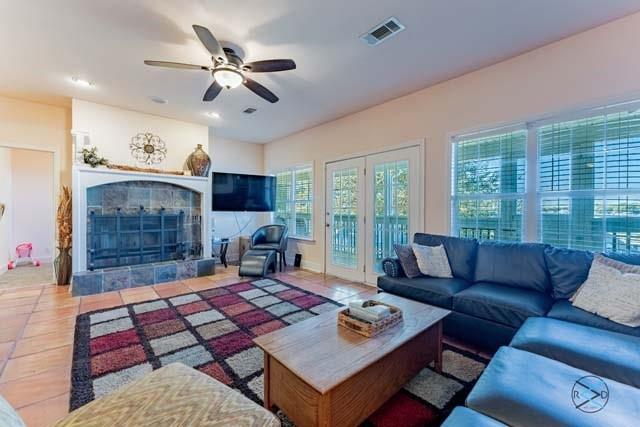 6209 Point La Vista Road Malakoff, TX 75148 - Photo 9 of 38 a living room with furniture ceiling fan and a large window