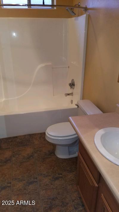 303 West Christopher Point Payson, AZ 85541 - Photo 19 of 27 a bathroom with a sink a toilet and a bathtub