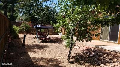 303 West Christopher Point Payson, AZ 85541 - Photo 23 of 27 a view of a backyard with large trees