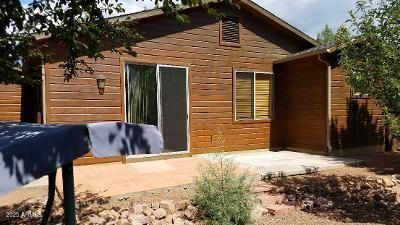 303 West Christopher Point Payson, AZ 85541 - Photo 24 of 27 a view of house with backyard and trees