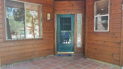 303 West Christopher Point Payson, AZ 85541 - Photo 4 of 27 a front view of a house with a glass door