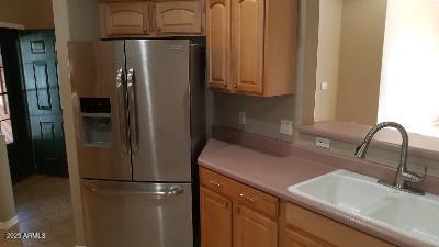 303 West Christopher Point Payson, AZ 85541 - Photo 9 of 27 a kitchen with stainless steel appliances granite countertop a refrigerator and a sink