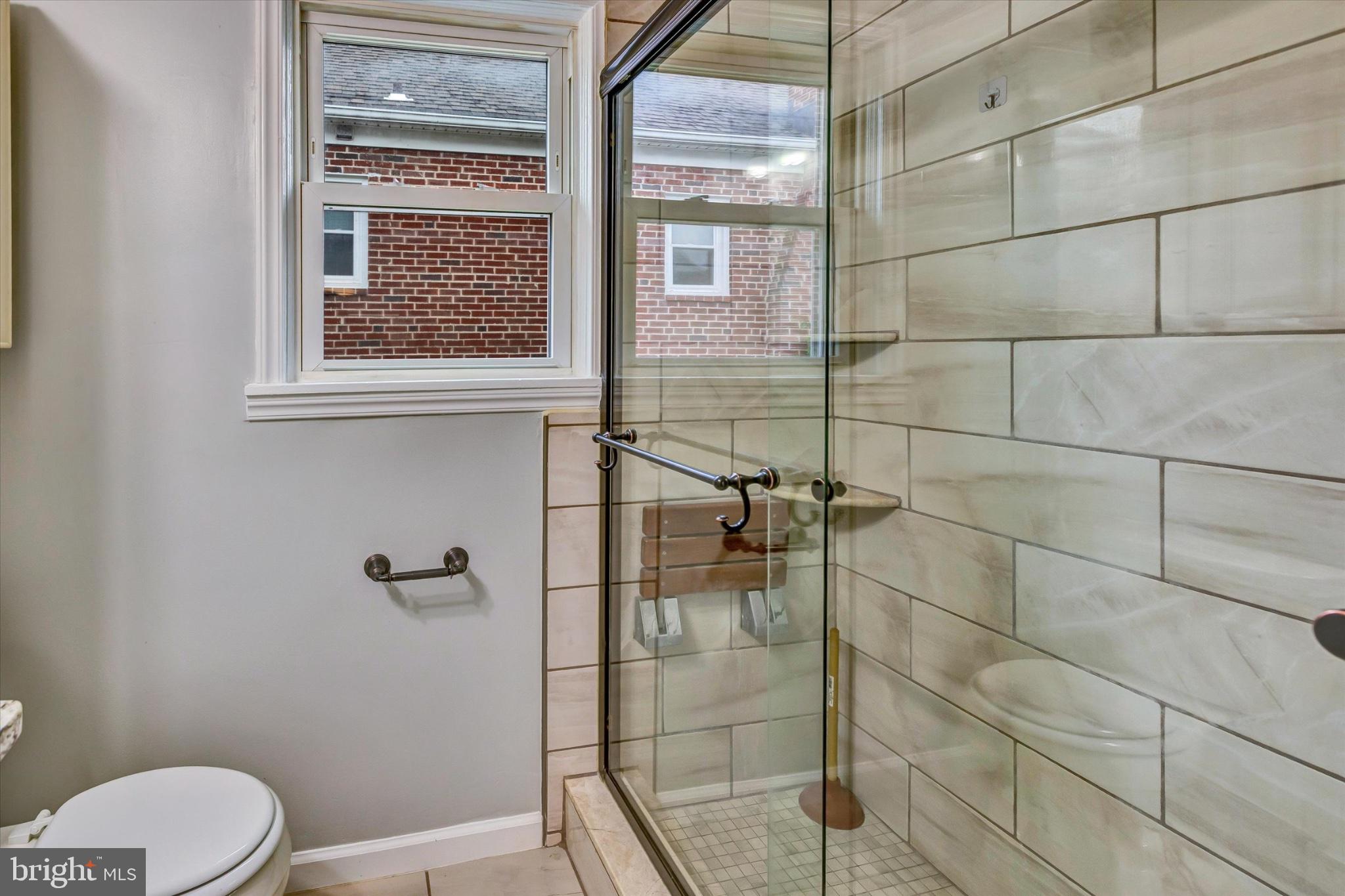 2806 Emerald Road Baltimore, MD 21234 - Photo 36 of 55 Walk-In Shower with Modern Ceramic Tile