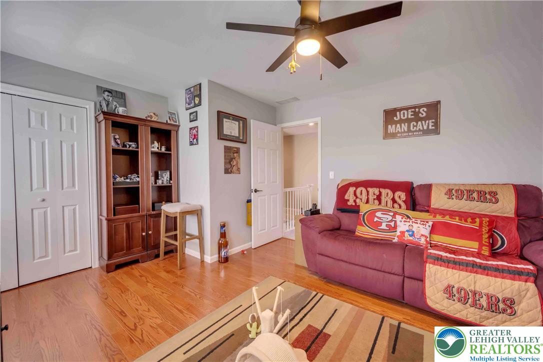 2448 Keeler Road Bath, PA 18014 - Photo 23 of 37 Well-lit room with gleaming hardwood floors offers versatile living space.