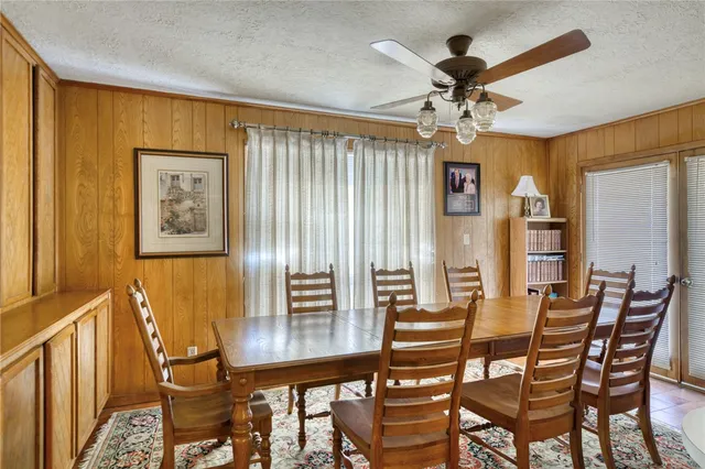 a kitchen with a refrigerator and a sink