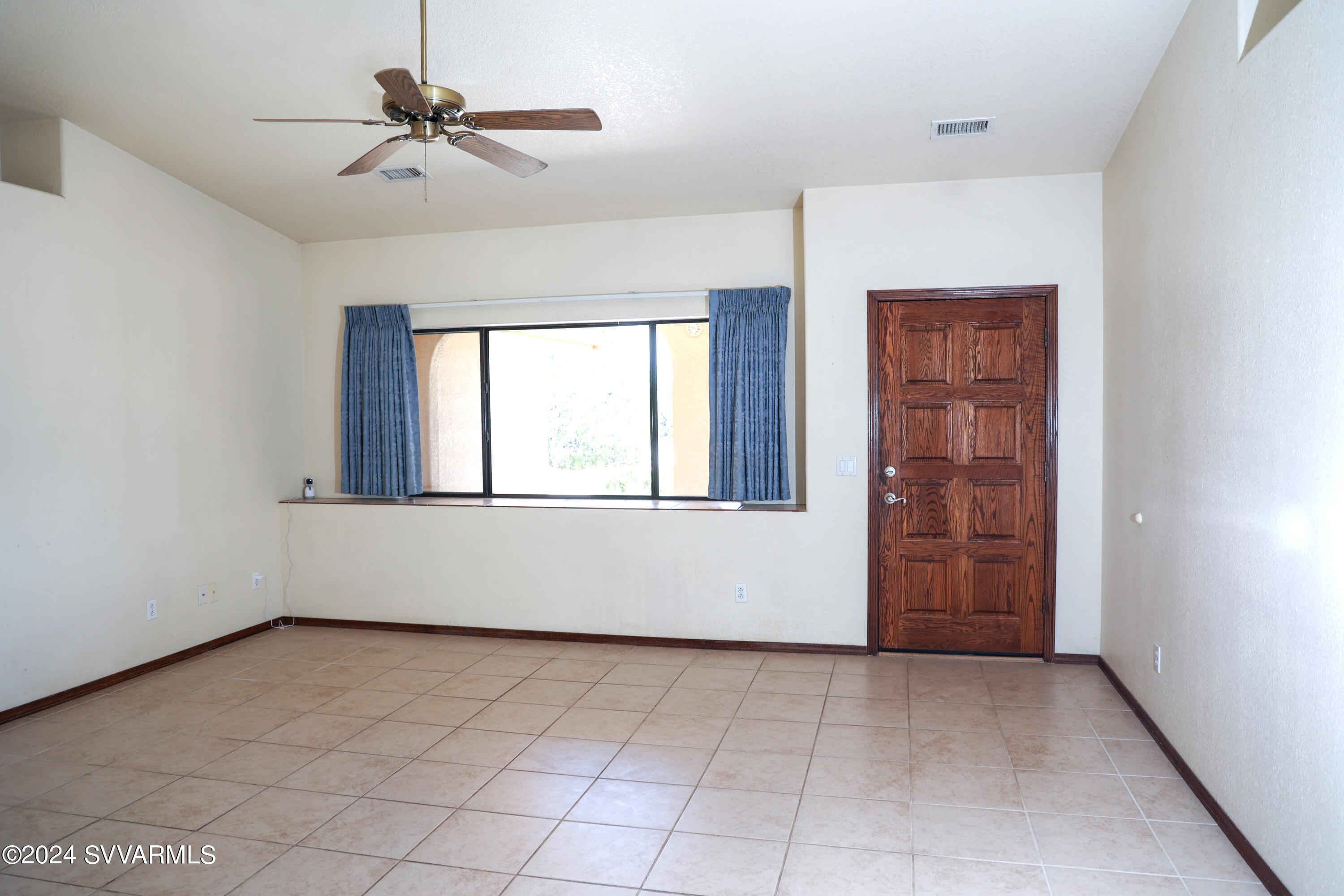 3240 Kit Carson Trail Rimrock, AZ 86335 - Photo 8 of 33 a view of an empty room with a window