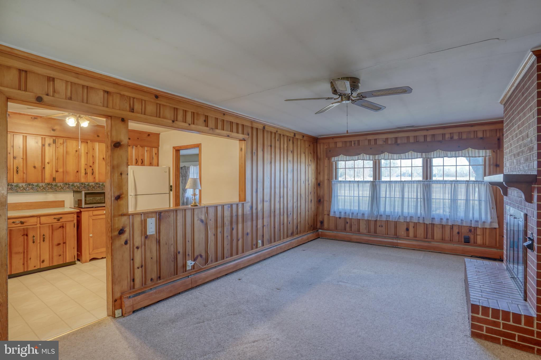 4215 Preston Road Hurlock, MD 21643 - Photo 11 of 40 workspace with wooden floor and windows