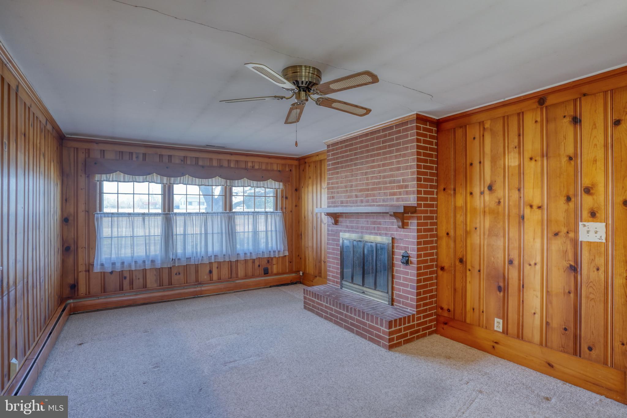 4215 Preston Road Hurlock, MD 21643 - Photo 13 of 40 a view of workspace with window and ceiling fan