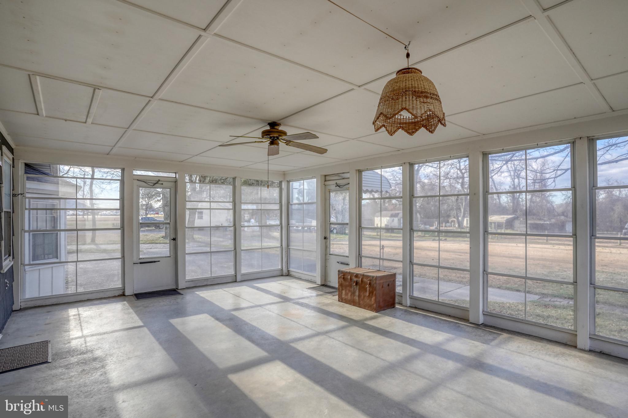 4215 Preston Road Hurlock, MD 21643 - Photo 23 of 40 a view of a livingroom with an empty space and a window