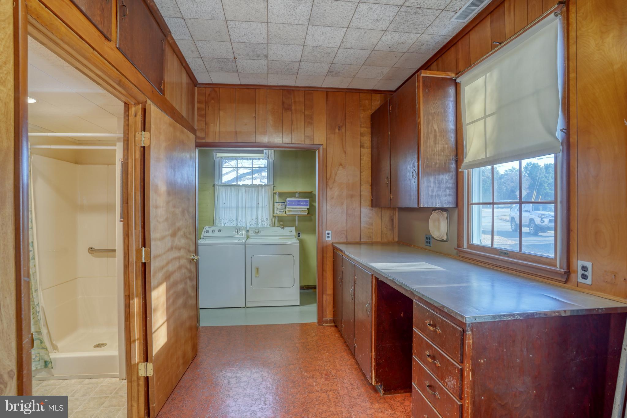4215 Preston Road Hurlock, MD 21643 - Photo 24 of 40 a kitchen with a sink and a refrigerator