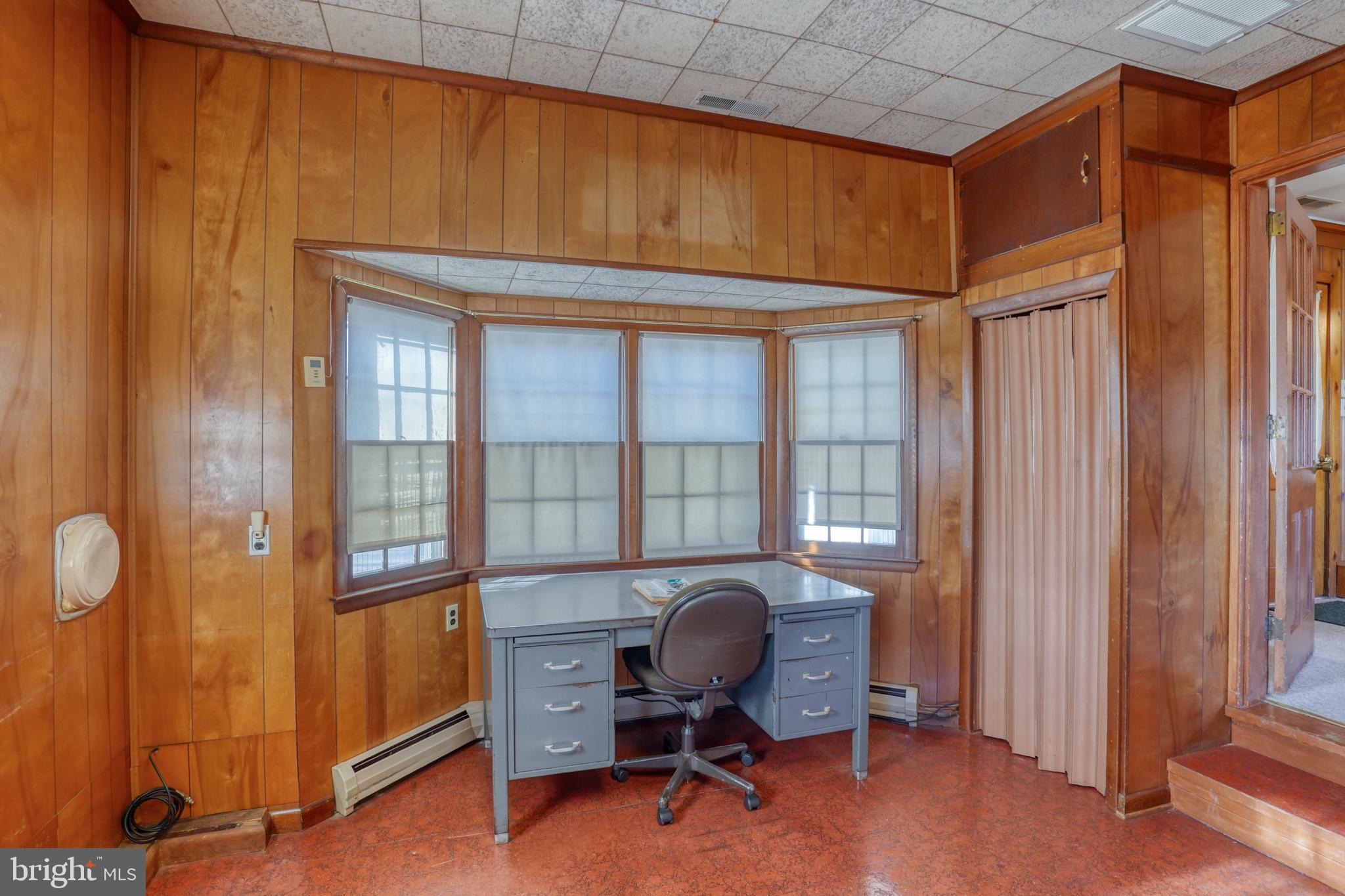 4215 Preston Road Hurlock, MD 21643 - Photo 26 of 40 a view of a workspace with furniture and a window