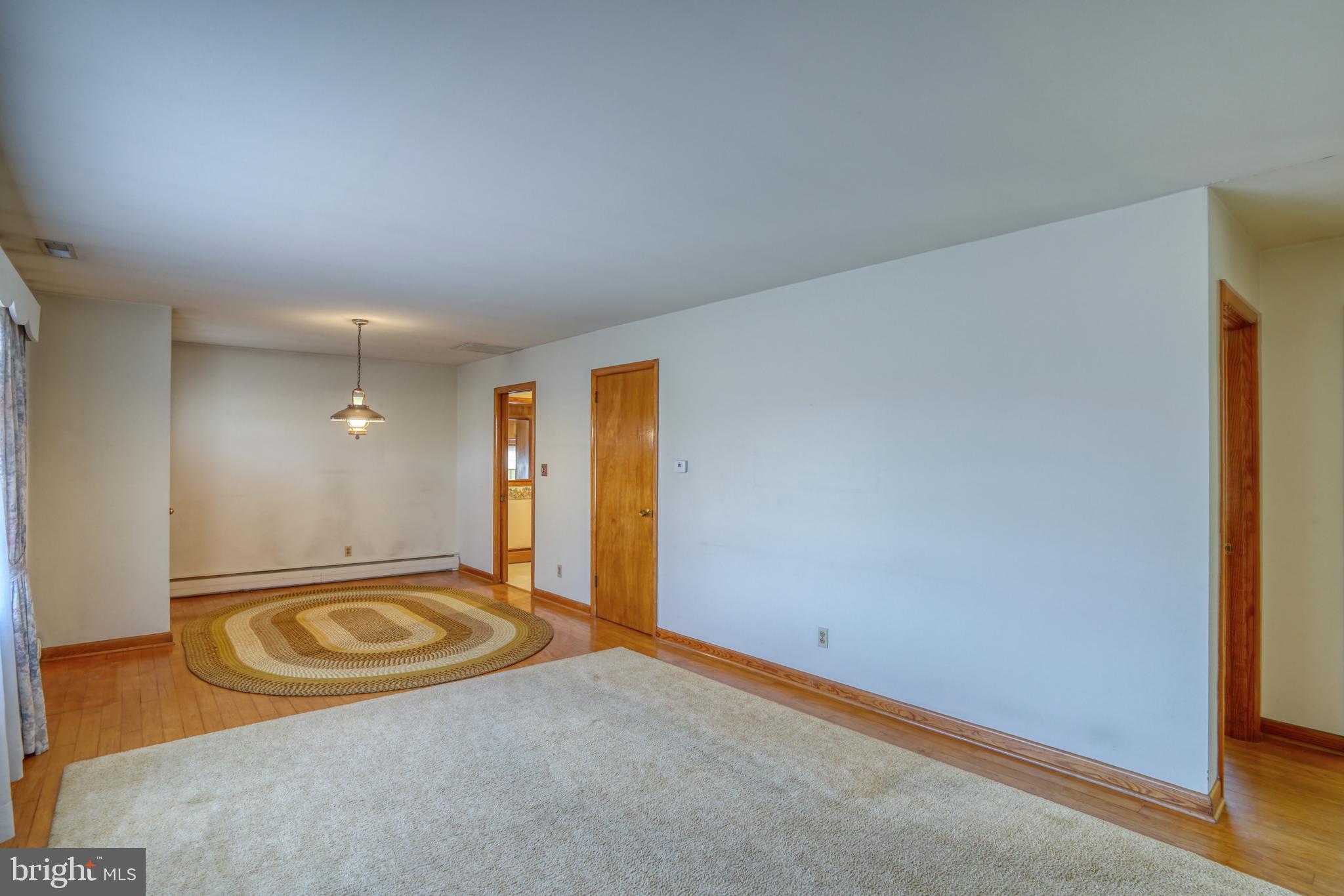 4215 Preston Road Hurlock, MD 21643 - Photo 33 of 40 a view of a livingroom with a sink and a mirror