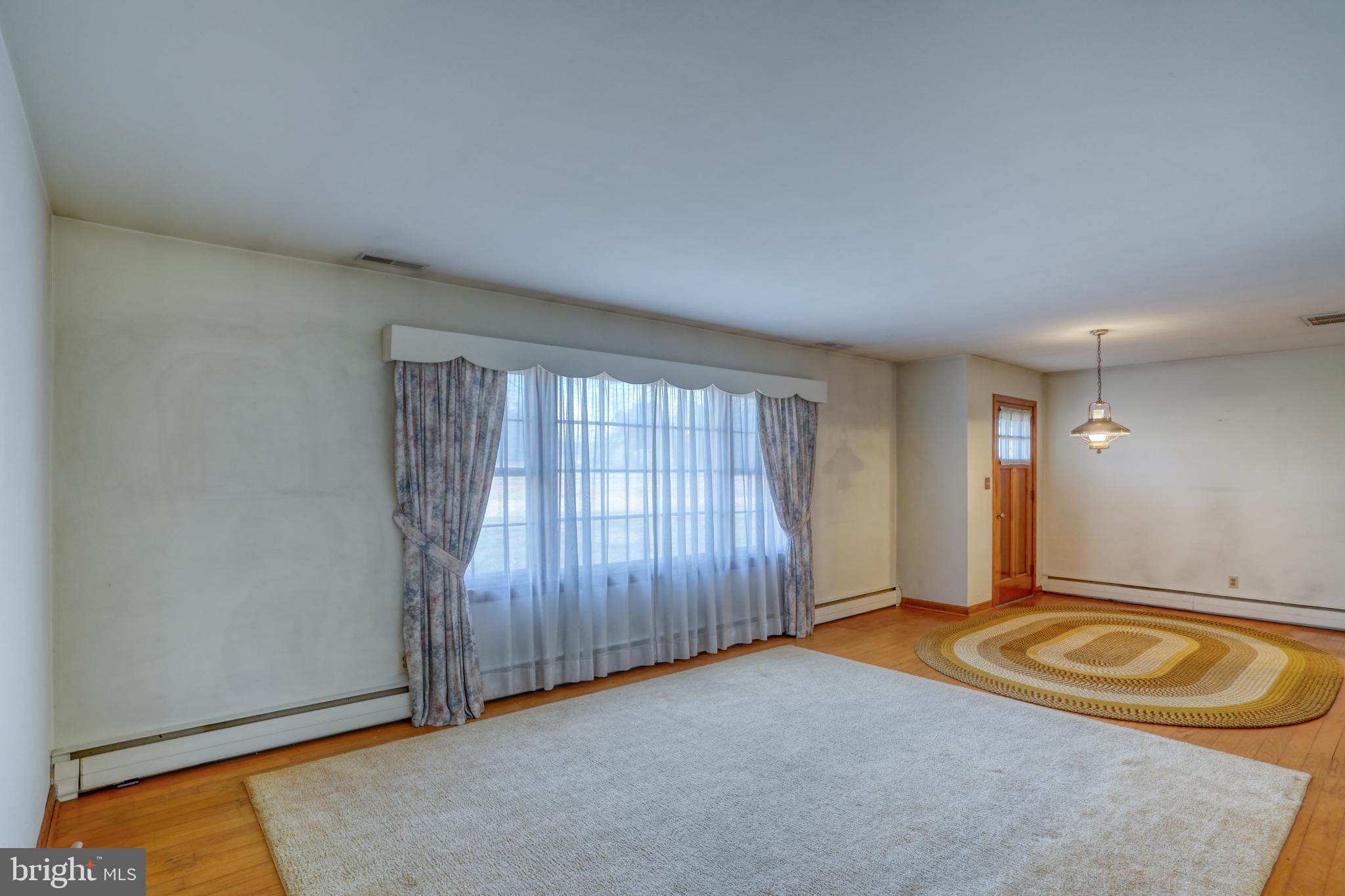 4215 Preston Road Hurlock, MD 21643 - Photo 34 of 40 an empty room with a door