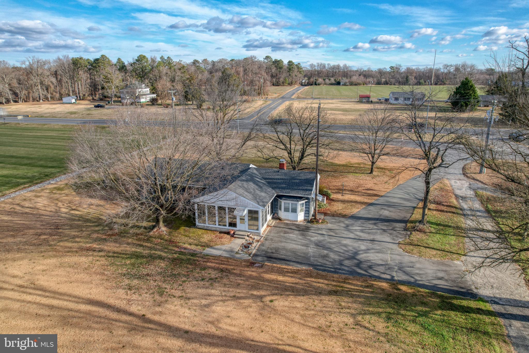 4215 Preston Road Hurlock, MD 21643 - Photo 5 of 40 a view of a lake with a yard and mountain view