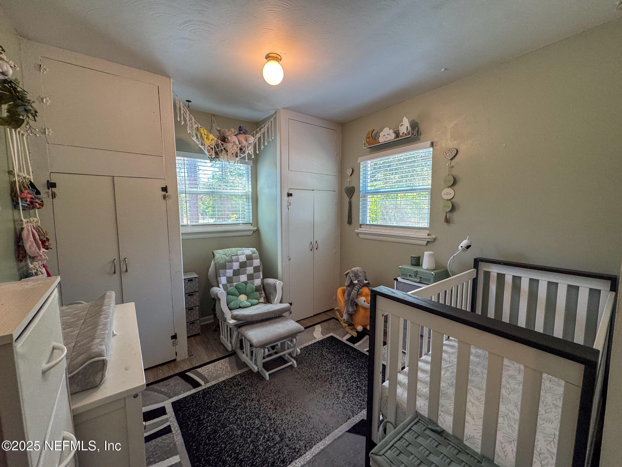 109 Mason Road Melrose, FL 32666 - Photo 16 of 27 a bedroom with furniture and a window