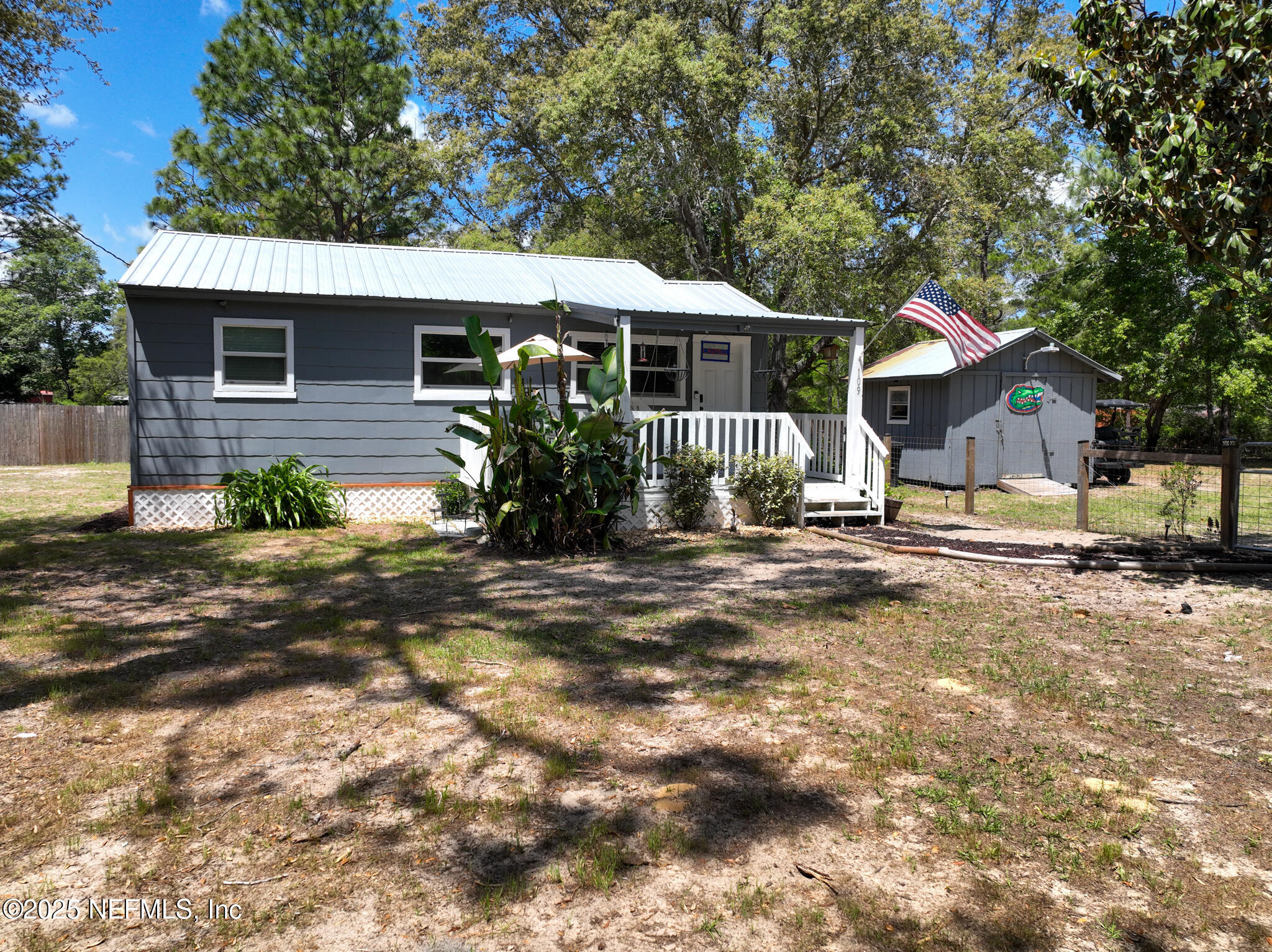 109 Mason Road Melrose, FL 32666 - Photo 19 of 27 a front view of a house with a yard
