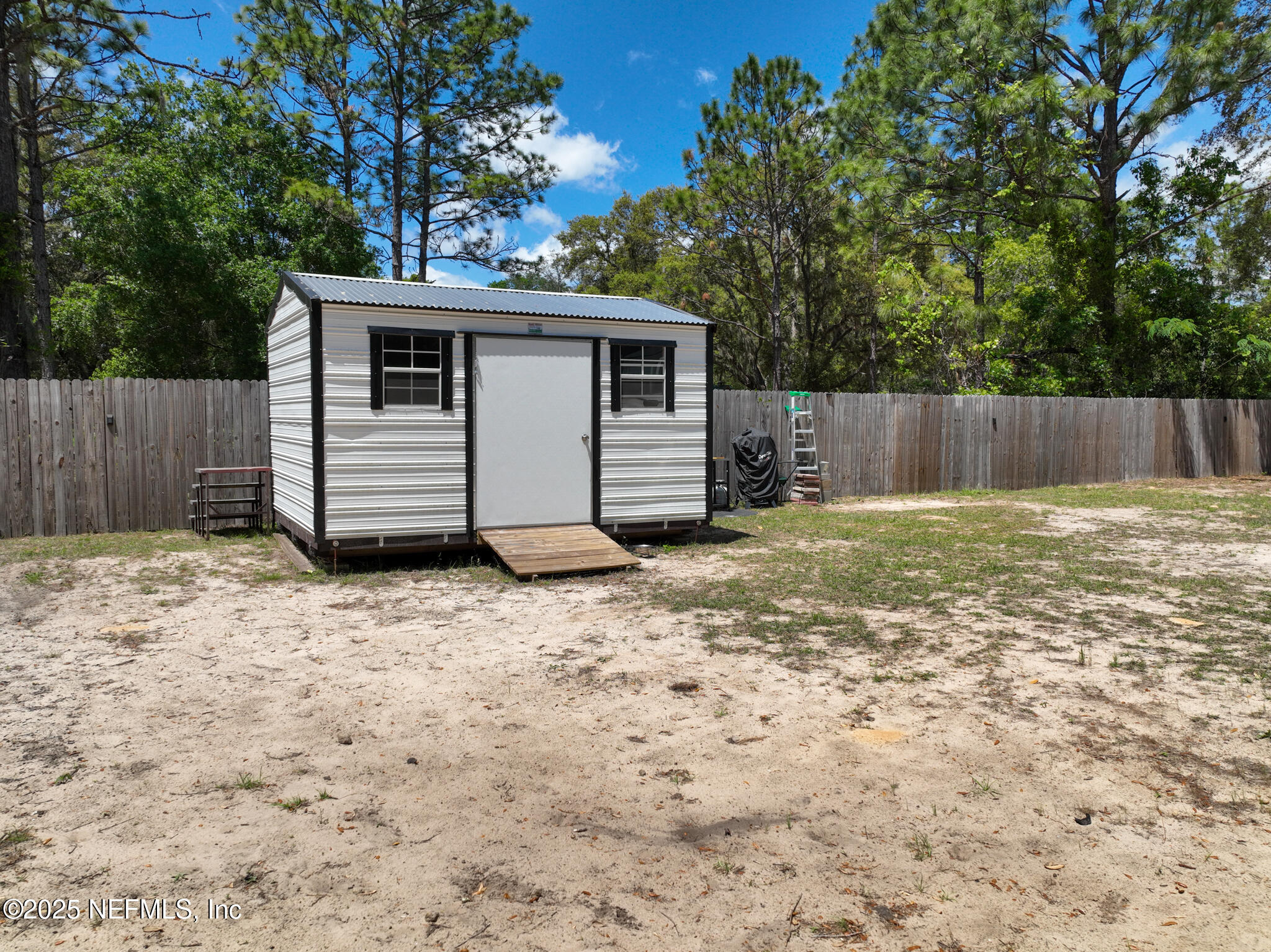 109 Mason Road Melrose, FL 32666 - Photo 21 of 27 a view of a backyard