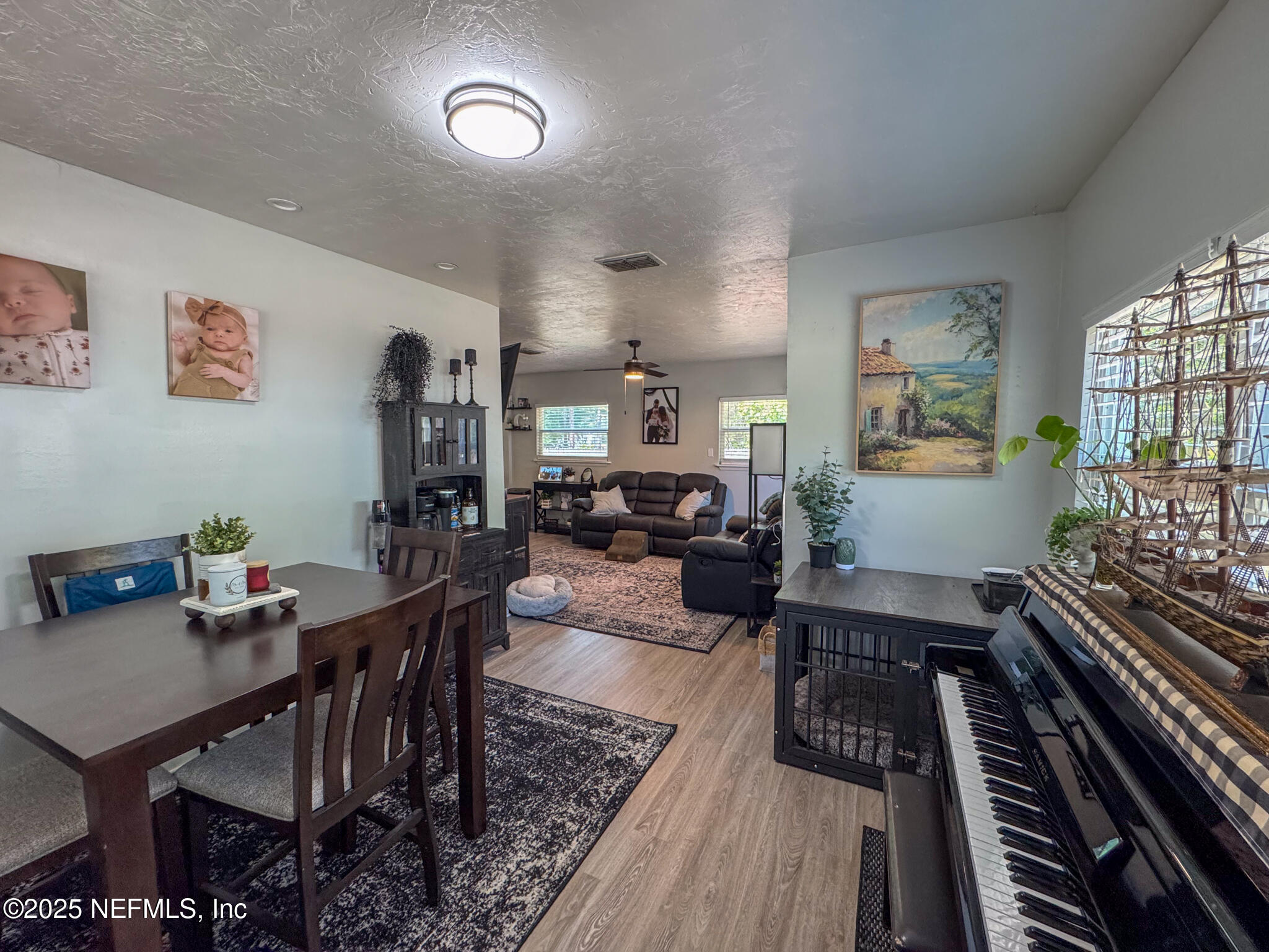 109 Mason Road Melrose, FL 32666 - Photo 5 of 27 a living room with furniture and a rug