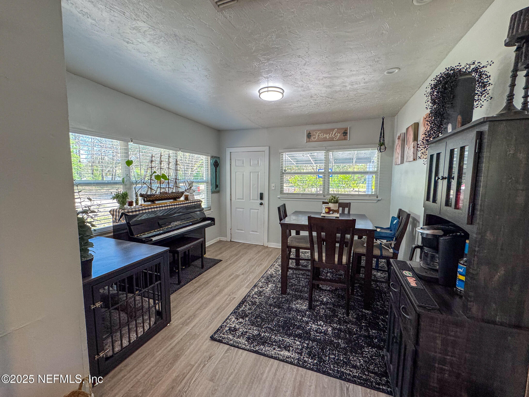 109 Mason Road Melrose, FL 32666 - Photo 6 of 27 a dining room with furniture and window