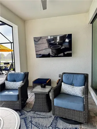 a living room with furniture and a couch