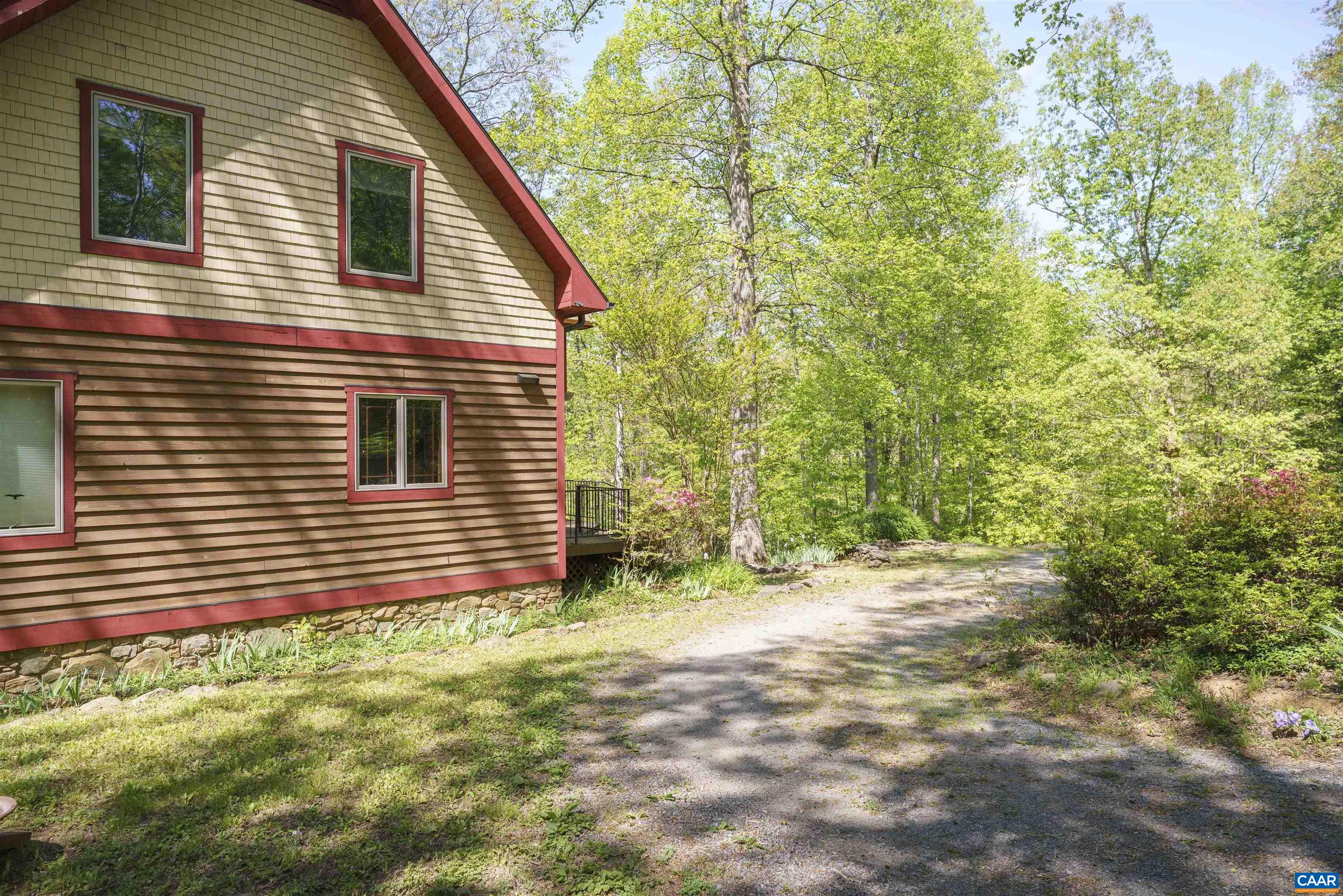7530 Damon Road Schuyler, VA 22969 - Photo 50 of 72 a view of a backyard with plants and large trees