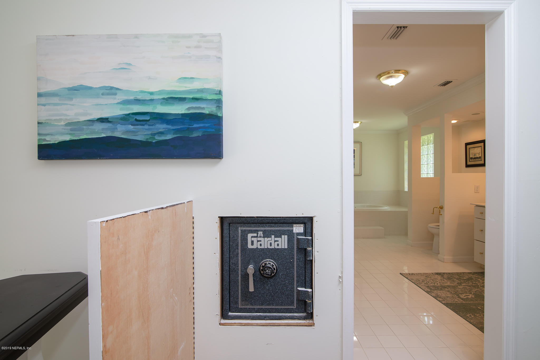 8166 Hollyridge Road Jacksonville, FL 32256 - Photo 24 of 49 Hidden Safe in Master