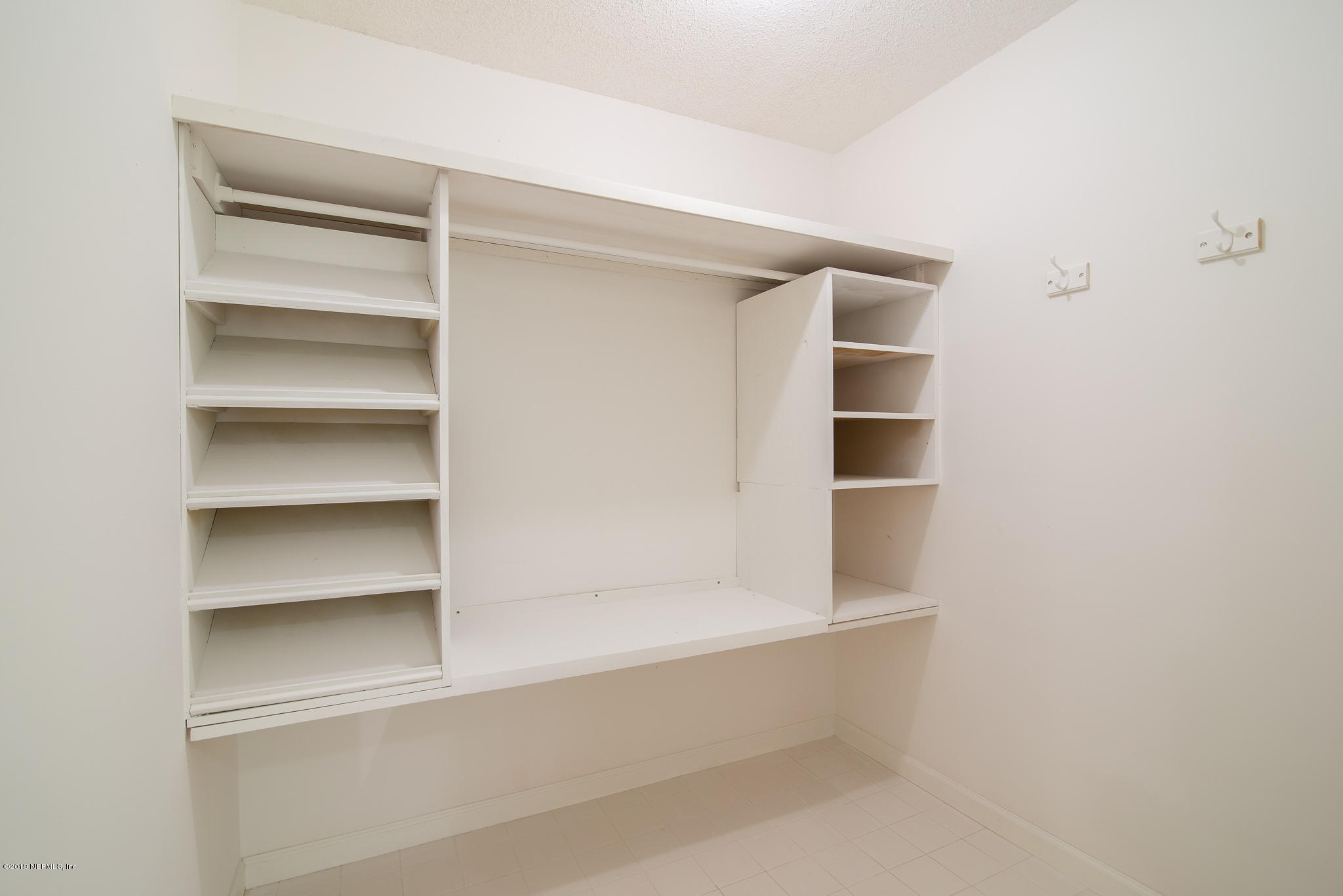 8166 Hollyridge Road Jacksonville, FL 32256 - Photo 27 of 49 Master Walk In Closet