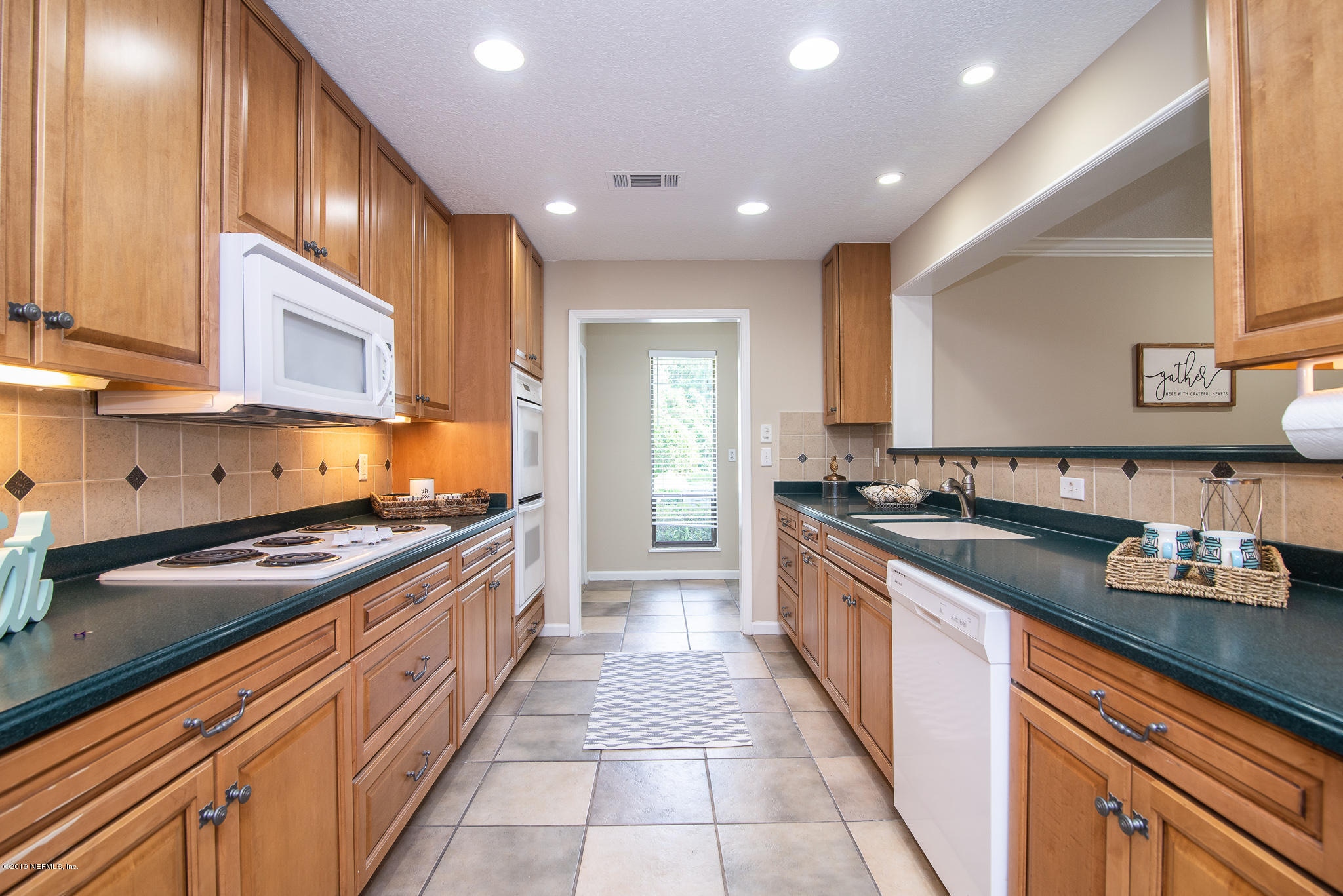 8166 Hollyridge Road Jacksonville, FL 32256 - Photo 31 of 49 Large Galley Kitchen