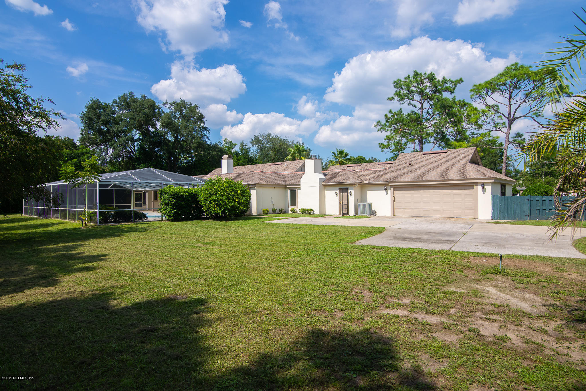 8166 Hollyridge Road Jacksonville, FL 32256 - Photo 5 of 49 Two Car Garage with Lots of Parking