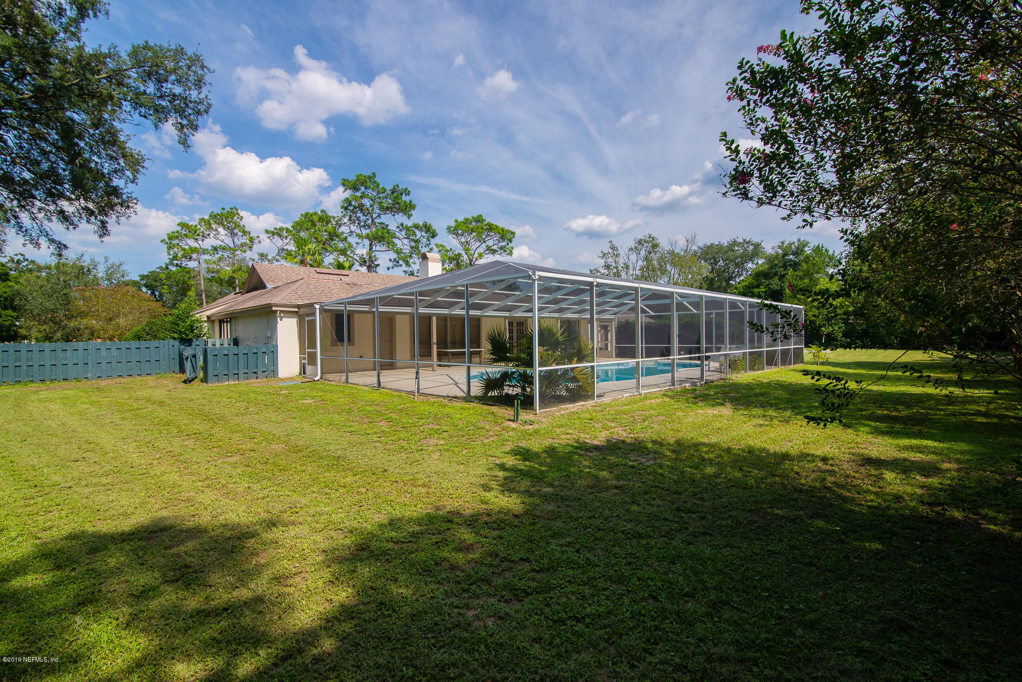 8166 Hollyridge Road Jacksonville, FL 32256 - Photo 7 of 49 Screened in Pool