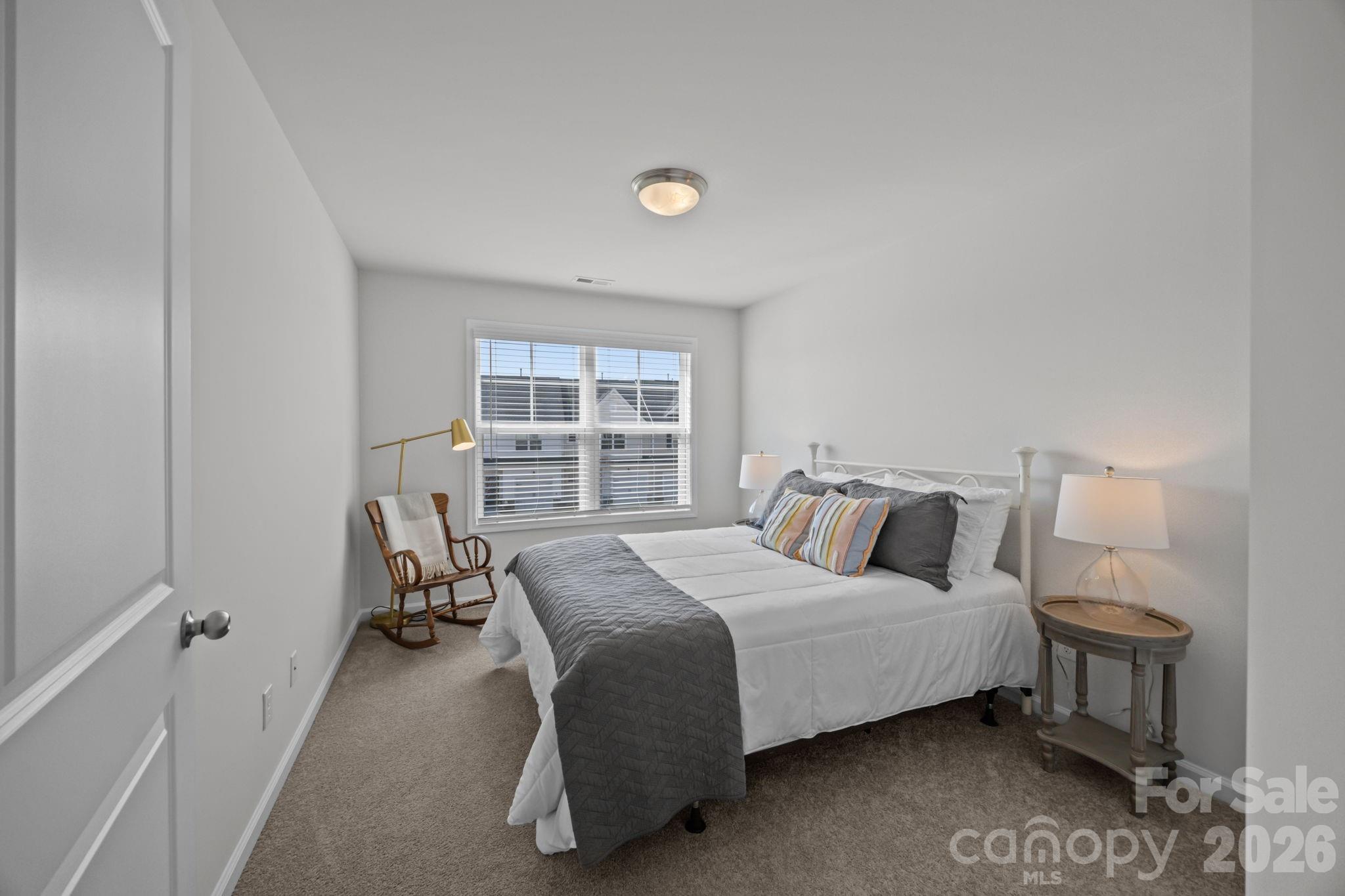 3808 Yorkshire Place Terrell, NC 28682 - Photo 25 of 36 a bedroom with a bed and a window