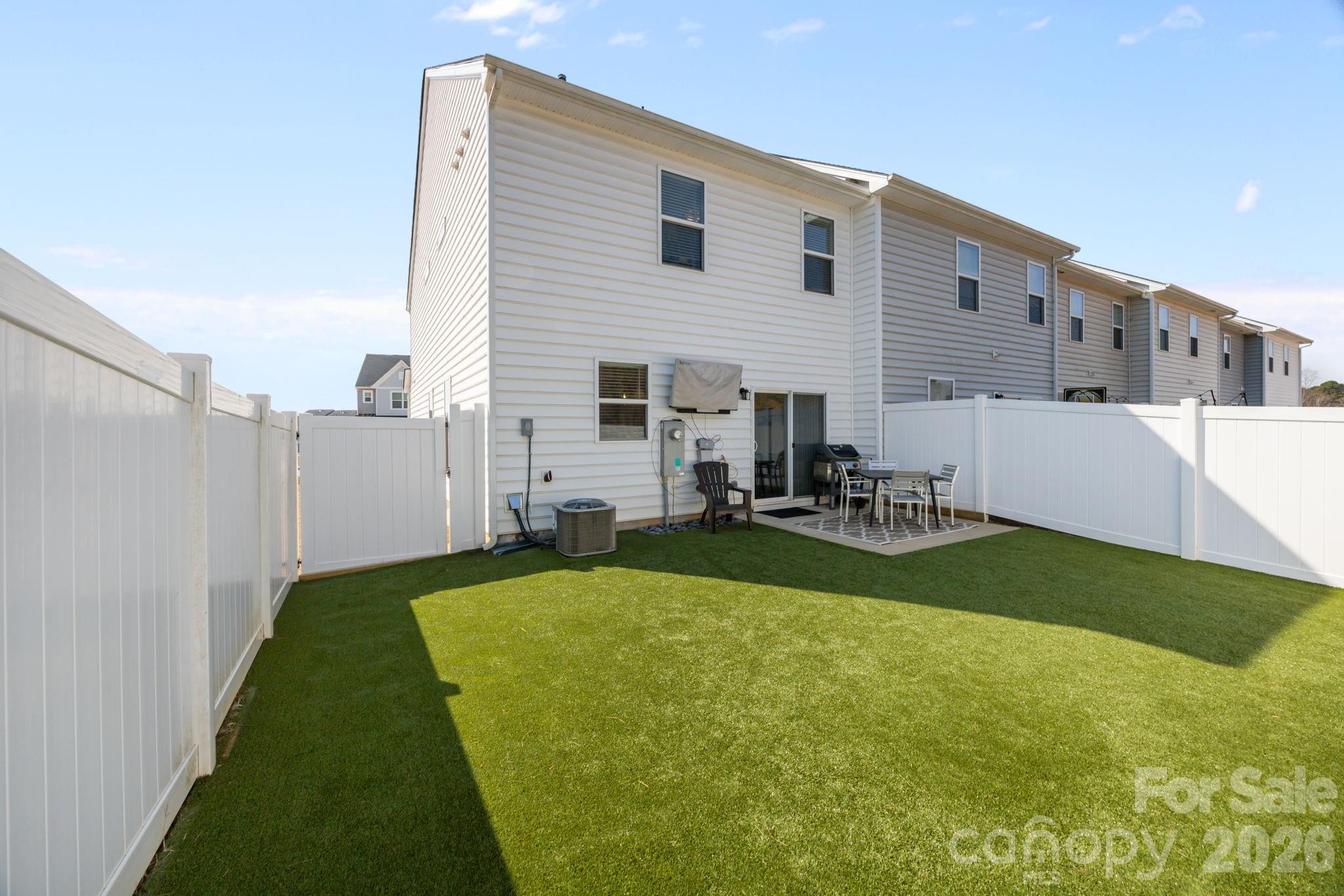 3808 Yorkshire Place Terrell, NC 28682 - Photo 29 of 36 a view of a backyard with plants and patio