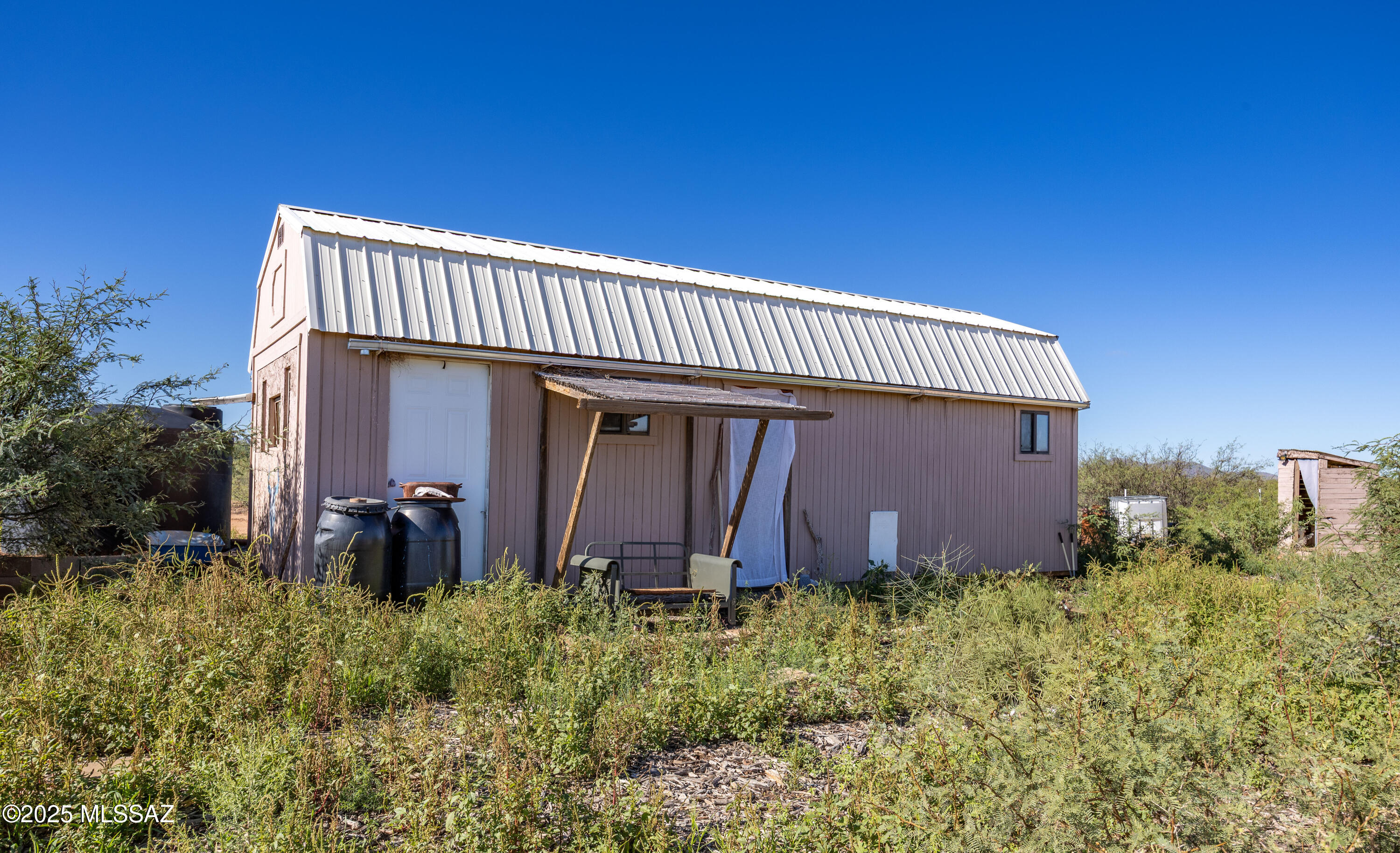 Tbd North Westward Trail, Unit 9 McNeal, AZ 85617 - Photo 21 of 37 a view of a house with many windows