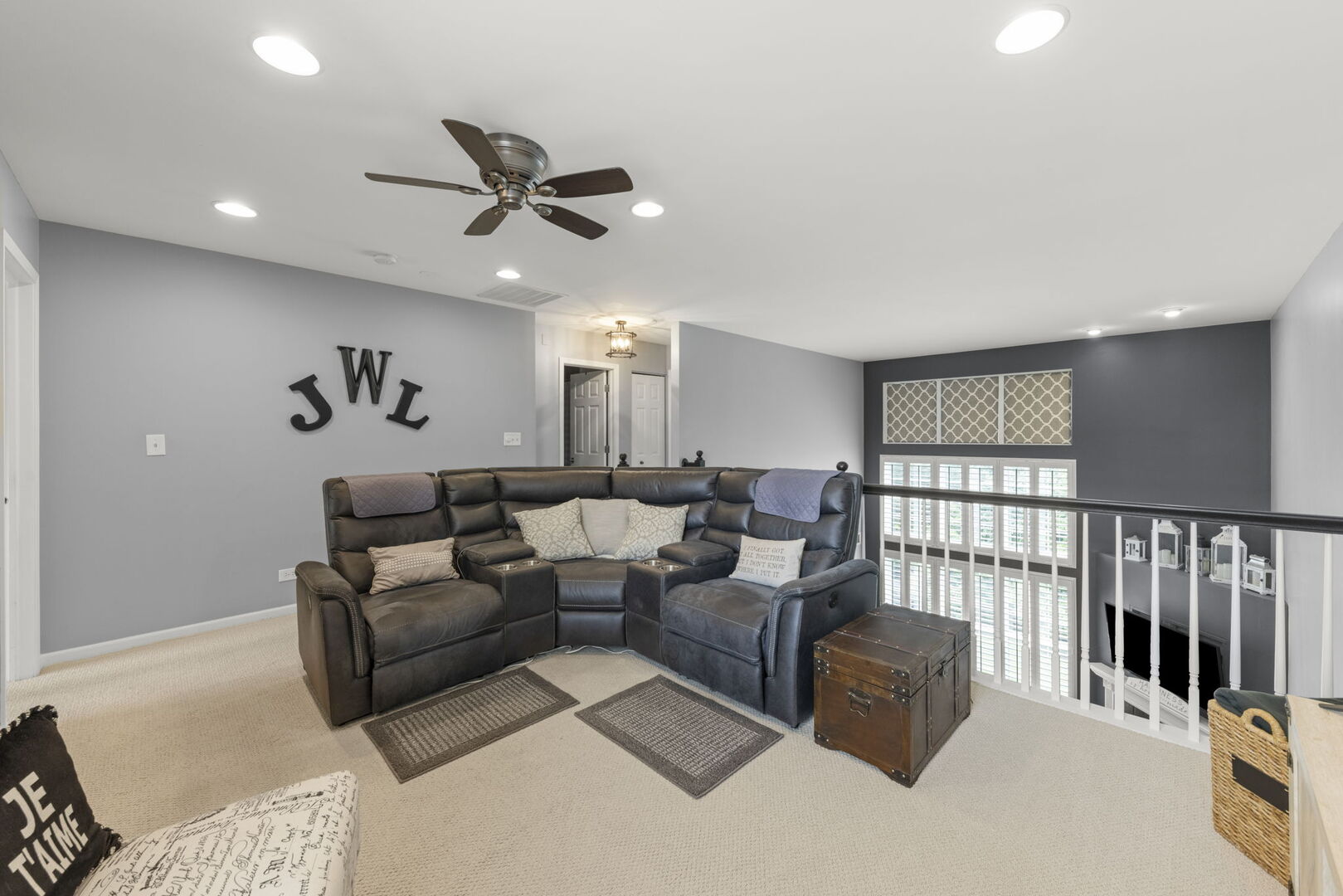 2406 Georgetown Circle Aurora, IL 60503 - Photo 17 of 28 a living room with furniture ceiling fan and a rug