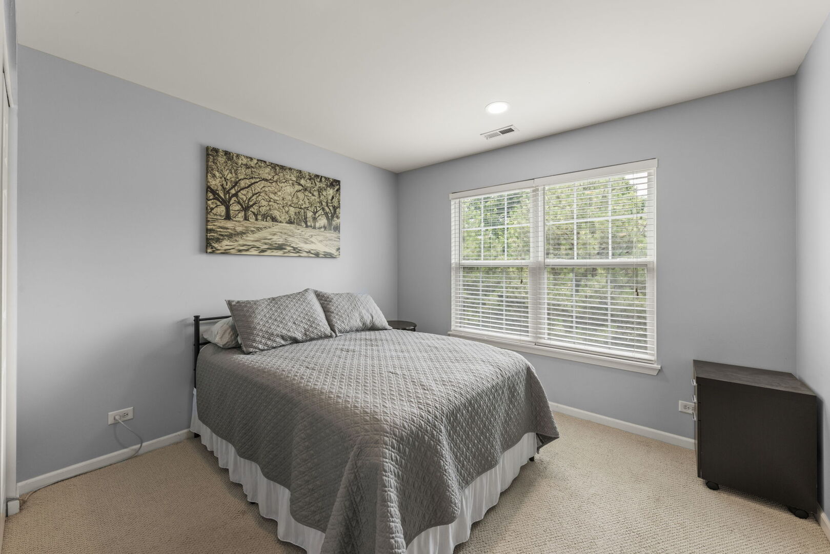 2406 Georgetown Circle Aurora, IL 60503 - Photo 24 of 28 a bedroom with a bed and a window