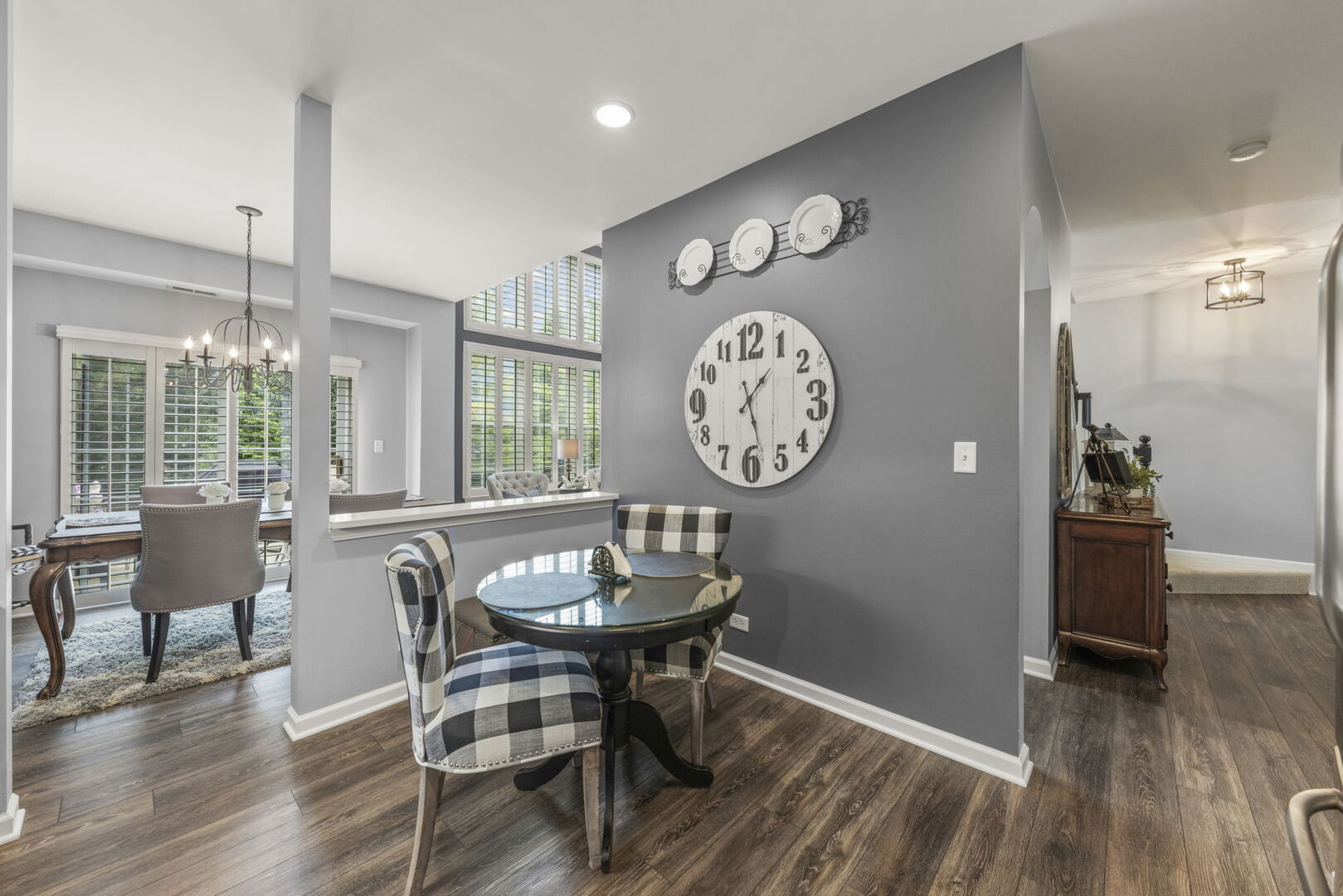 2406 Georgetown Circle Aurora, IL 60503 - Photo 10 of 28 a view of a dining room with furniture window and wooden floor