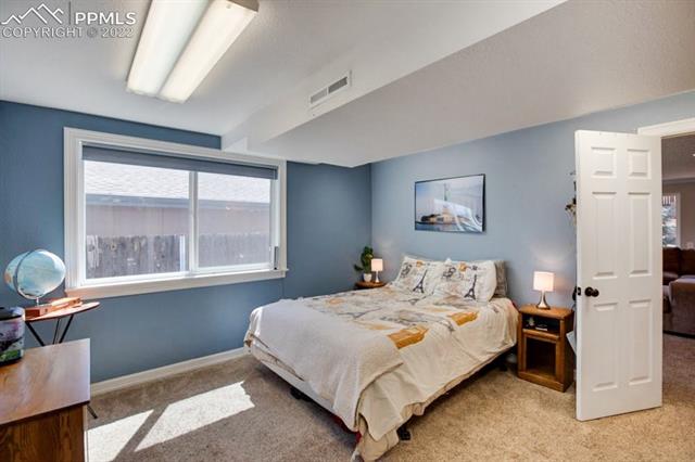 691 Gilcrest Road Colorado Springs, CO 80906 - Photo 24 of 28 Downstairs bedroom