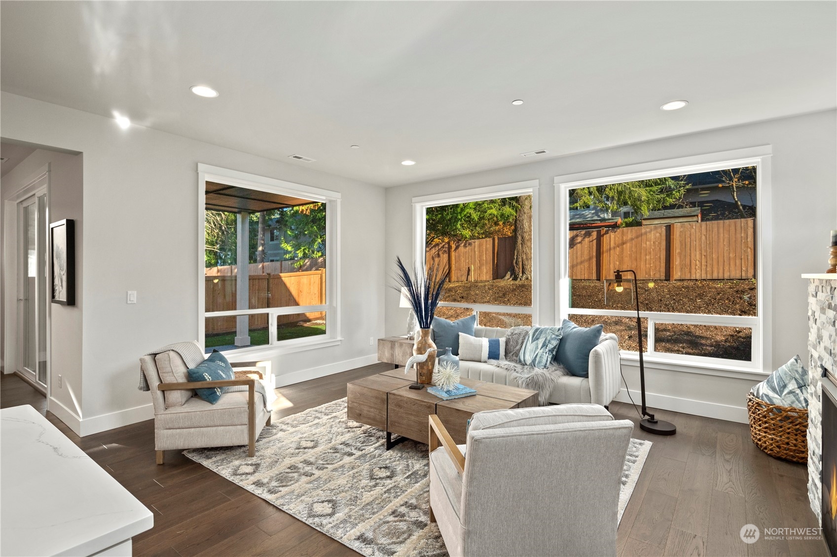 8711 240th Street Southwest Edmonds, WA 98026 - Photo 11 of 37 a living room with furniture and a large window